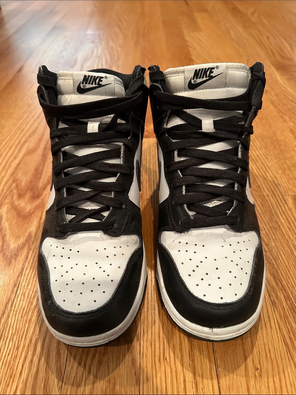Nike Women’s Black and White High-Top Sneakers